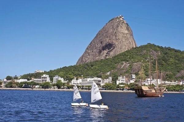 Rio de Janeiro, Brazil, View of Sugar Loaf Mountain by boat in Botafogo Bay. Two