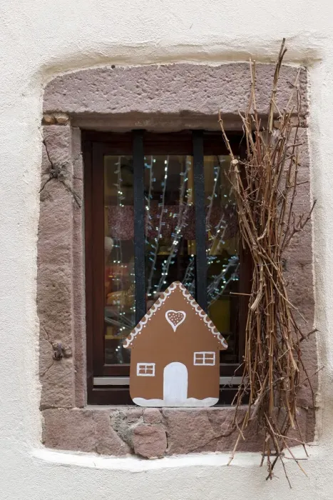 Framed Print : Riquewihr, France. Village established in the 1400s in the Alsace Region. Window decorated with Christmas ornaments