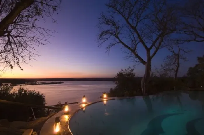 Framed Print : The River Club lodge, sunset on Zambesi River, Zambia