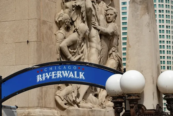 Framed Print : Riverwalk signage along the Chicago River in downtown Chicago with Michigan Avenue bas-relief Framed Print : Riverwalk signage along the Chicago River in downtown Chicago with Michigan Avenue bas-relief