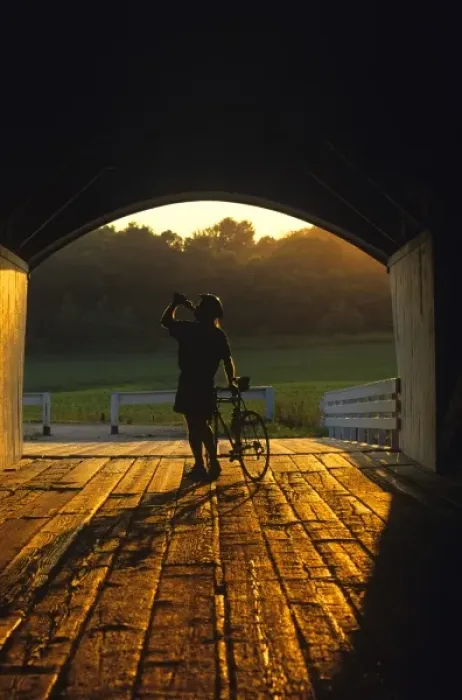 Framed Print : Road bicyclist takes water break at the Hogback Covered Bridge in Madison County Framed Print : Road bicyclist takes water break at the Hogback Covered Bridge in Madison County