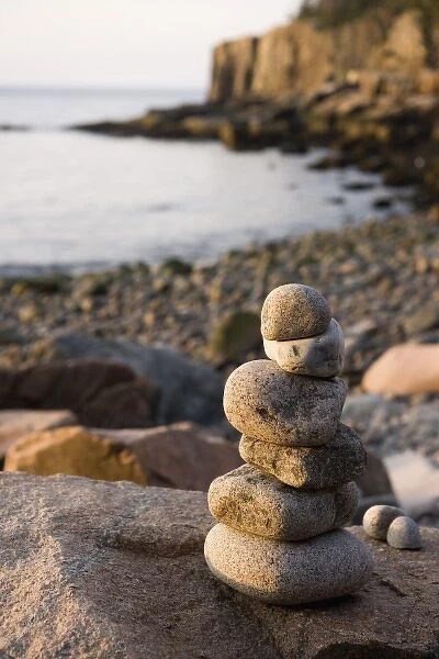 A rock cairn on the cobblestone beach in Momument Cove in Maines Acadia National Park
