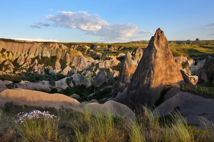 Framed Print : Rock formations in the valley. Goreme, Cappadocia, Turkey