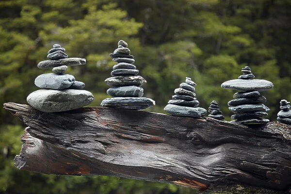 Rock stacks made by tourists by Fantail Falls, Hst Pass, Mt. Aspiring National Park