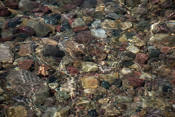 Rocks under water, Lakeshore Trail, Colter Bay, Grand Tetons National Park, Wyoming, USA