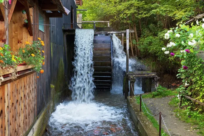 Framed Print : Romania, Transylvania, Fagaras. Ohaba. Oldest functioning grist mill with water wheel. The miller and wife