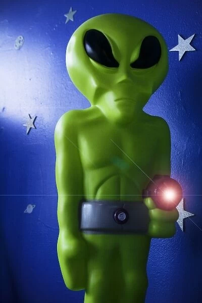 Roswell, New Mexico, United States. Green alien with ray run for sale in local store