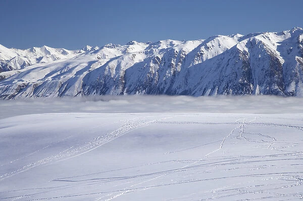 The Roundhill Ski Area with fog covered Lake Tekapo and the Hall Range, Mackenzie Country