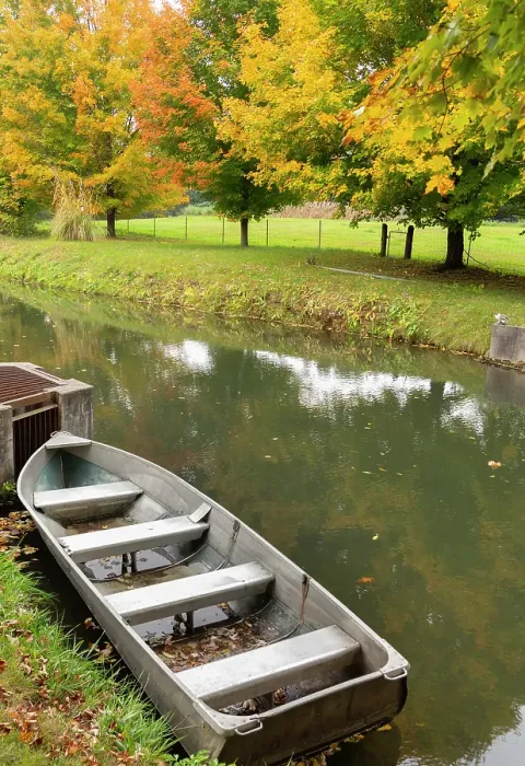 Framed Print : Rowboat on river at Miller's Cider Mill in Amish Country in Middlebury, northern Indiana Framed Print : Rowboat on river at Miller's Cider Mill in Amish Country in Middlebury, northern Indiana