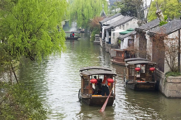 Rowing boat on the Grand Canal, Nanxun Ancient Town, Zhejiang Province, China
