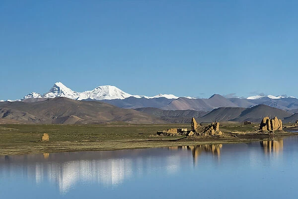 Ruins by a lake on Tibetan Plateau, Dhaulagiri (8167m) in the distance on the left
