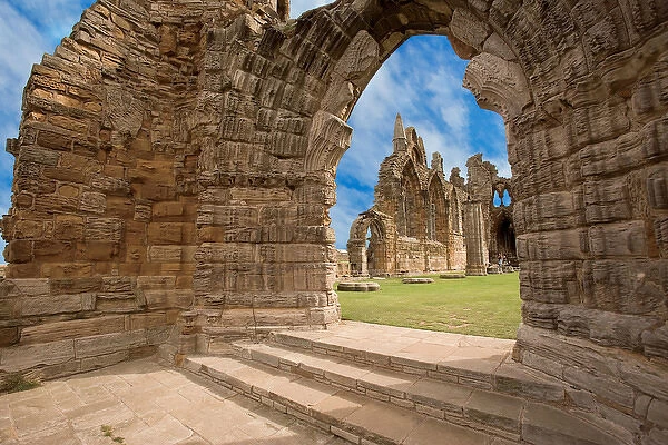The Ruins of Whitby Abbey above the town and harbor of Whitby on the North Yorkshire