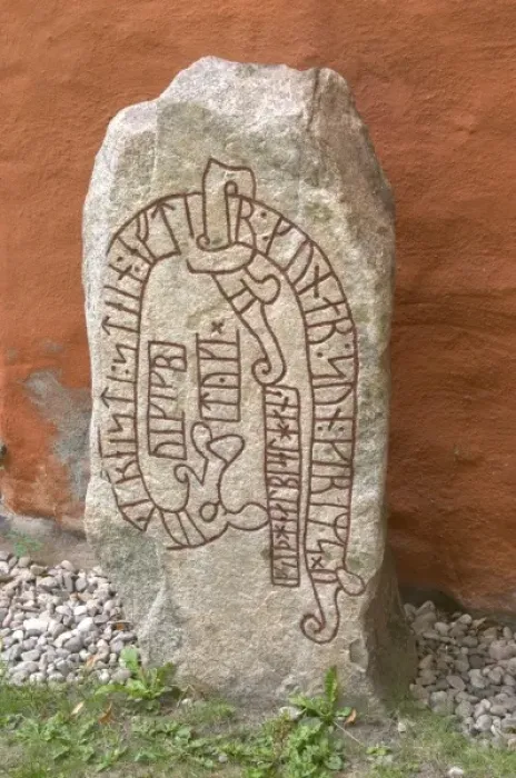 Framed Print : Rune stone outside the cathedral dating from the 11th century. The stone was put Framed Print : Rune stone outside the cathedral dating from the 11th century. The stone was put