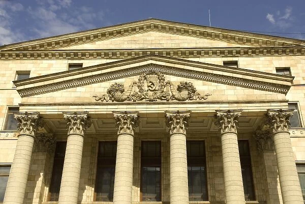 Russia. Moscow. Petrovska Street. Classical facade wtih hammer and sycle
