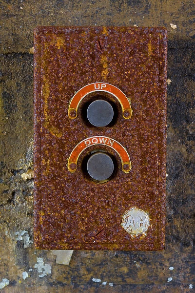 The rusted elevator control in the abandoned Roosevelt Sweater Mill