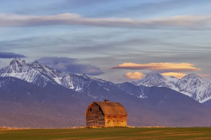 Framed Print : Rustic old barn in evening light with Mission Mountains in Pablo, Montana, USA Framed Print : Rustic old barn in evening light with Mission Mountains in Pablo, Montana, USA