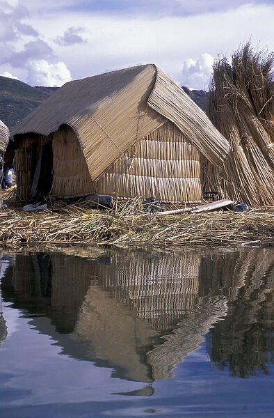 SA, Peru, Lake Titicaca, Uros Floating Islands Homes made of reeds; highest navigable