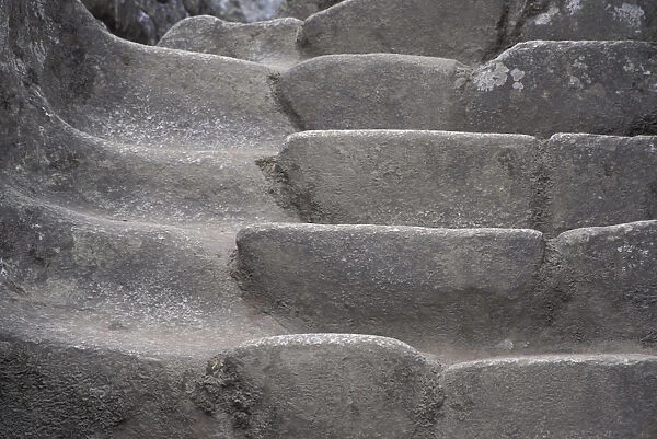 SA, Peru, Machu Picchu Worn stair detail near Condors Temple