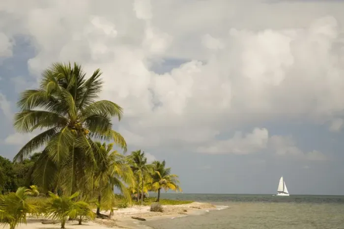 Framed Print : Sailboat on Caribbean Sea, viewed from Chabil Mar Villas, Placencia, Stann Creek District