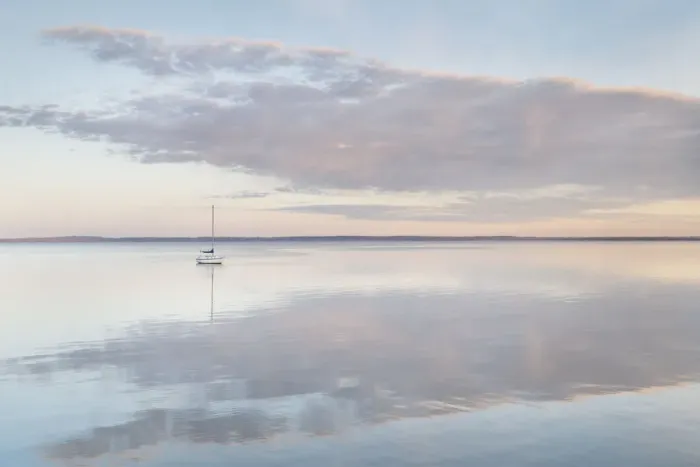 Framed Print : Sailboat and morning clouds reflected in calm waters of Bellingham Bay, Washington State