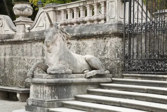 Framed Print : Salzburg, Salzburg, Austria - Closeup of a stone unicorn. It is resting on a pillar