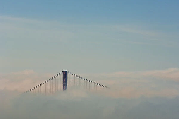 San Francisco, California. Golden Gate Bridge above fog bank