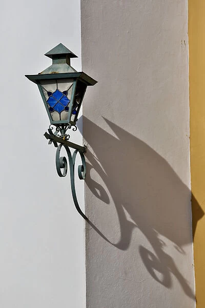 San Miguel De Allende, Mexico. Lantern and shadow on colorful buildings