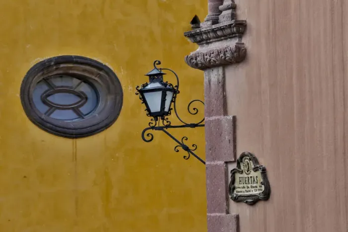 Framed Print : San Miguel De Allende, Mexico. Lantern and shadow on colorful buildings Framed Print : San Miguel De Allende, Mexico. Lantern and shadow on colorful buildings