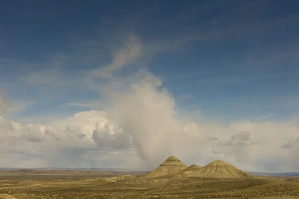 Sandstone Buttes (Badlands) Uinta County near Interstate 80, Wyoming. Low hanging Cumulus Clouds