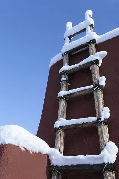 Santa Fe, New Mexico, USA. Kiva ladder and adobe