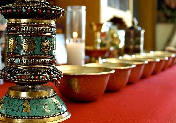 Santa Fe, New Mexico, USA. Tibetan ceremonial prayer wheel and bowls