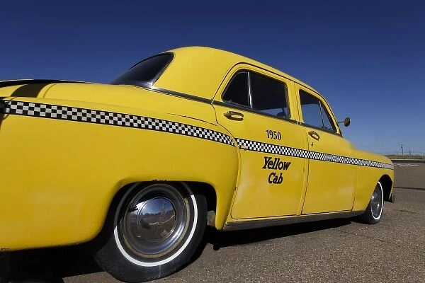 Santa Rosa, New Mexico, United States. Old Yello Cab taxi on Route 66