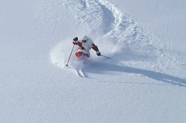 Santa Skiing at Snowbird Ski Resort, Wasatch Mountains, Utah. (MR)