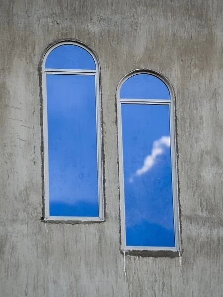 Santiago Atitlan, Guatemala Clouds reflected in mirrored windows