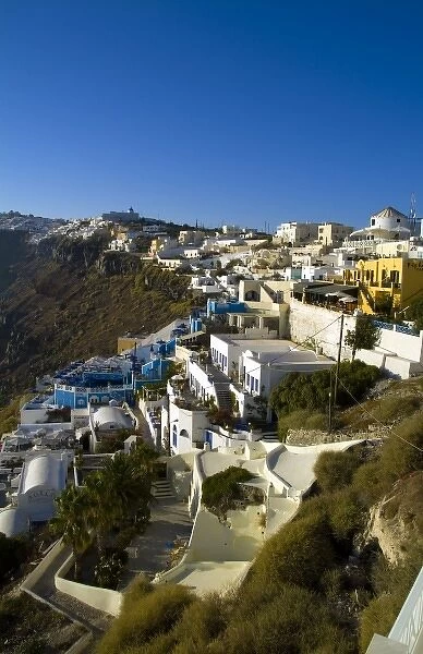 Santorini Greece and the beautiful white buildings on the mountain cliffs of the
