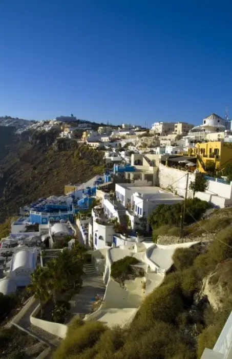 Framed Print : Santorini Greece and the beautiful white buildings on the mountain cliffs of Framed Print : Santorini Greece and the beautiful white buildings on the mountain cliffs of