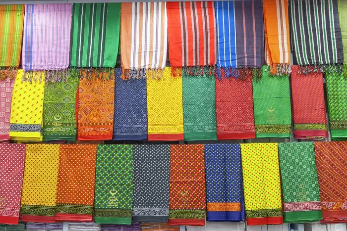 Framed Print : Saudi Arabia, Mecca, Jeddah, Al-Balad. Colorful cloth in the Al-Balad historical district of Jeddah