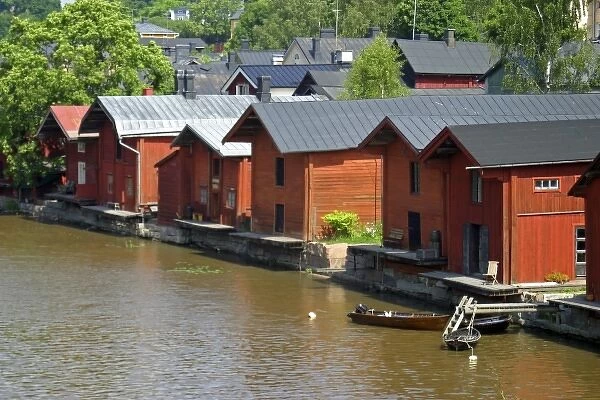 Scandinavia, Finland, Porvoo. Wooden storehouses line the Porvoonjoki river in scenic Porvoo