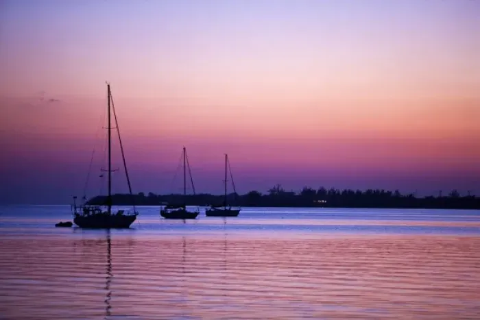 Framed Print : A scenic of sail boats in the bay at Utila in Honduras Framed Print : A scenic of sail boats in the bay at Utila in Honduras