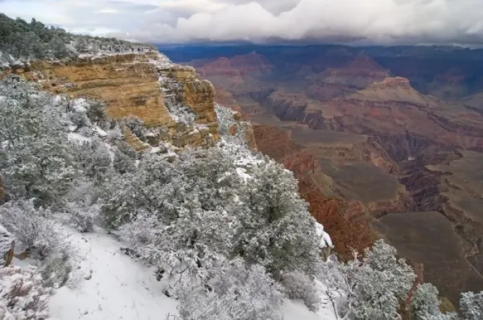 Framed Print : Scenic snowy winter landscape along the south rim of the majestic Grand Canyon at sunrise Framed Print : Scenic snowy winter landscape along the south rim of the majestic Grand Canyon at sunrise