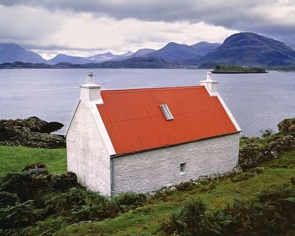 Scotland, Highland, Wester Ross, Applecross. Red-roofed home near Applecross faces