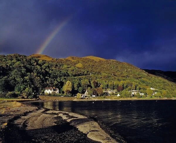Scotland, Highland, Wester Ross, Onich. A rainbow decorates the sky above Onich