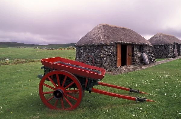 Scotland, Isle of Skye, Kilmuir. Rural landscape and wheelbarrow