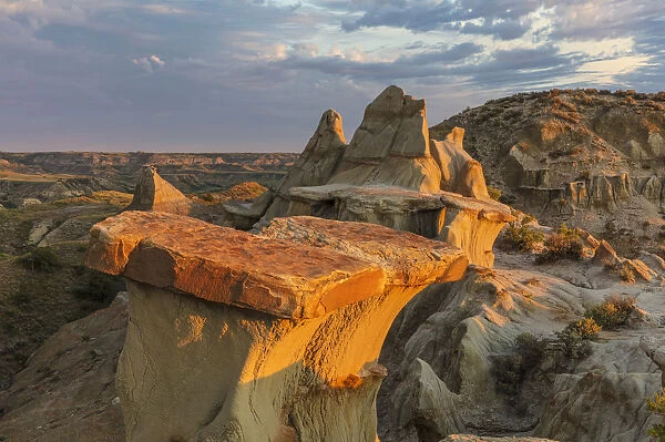 Sculpted badlands formations at first light in Theodore Roosevelt National Park, North Dakota