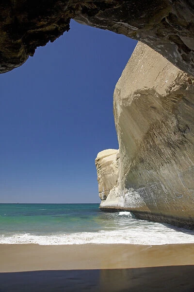 Sea cave, beach and cliffs, Tunnel Beach, Dunedin, South Island, New Zealand