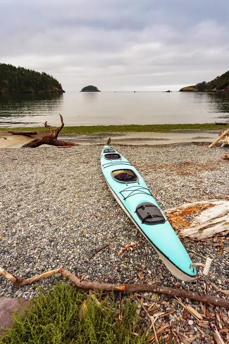 Framed Print : Sea kayak on the shore of Bowman Bay, Deception Pass State Park, Washington State, USA Framed Print : Sea kayak on the shore of Bowman Bay, Deception Pass State Park, Washington State, USA