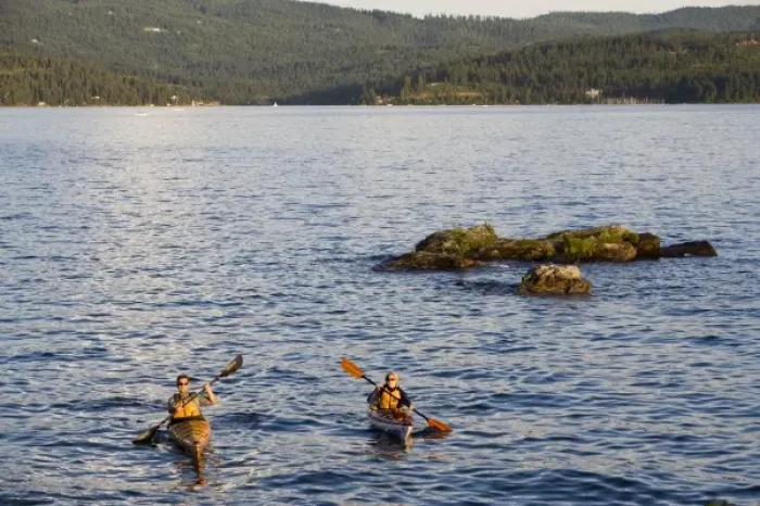 Framed Print : Sea kayakers on Lake Coeur d Alene in Idaho No real estate or resort use allowed (MR)