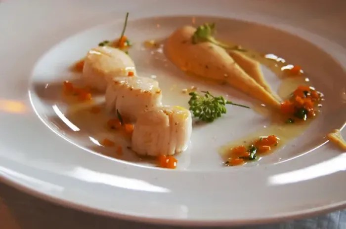 Framed Print : Sear fried scallops and parsnip on a white plate. The gastronomic restaurant Tva Broder Framed Print : Sear fried scallops and parsnip on a white plate. The gastronomic restaurant Tva Broder