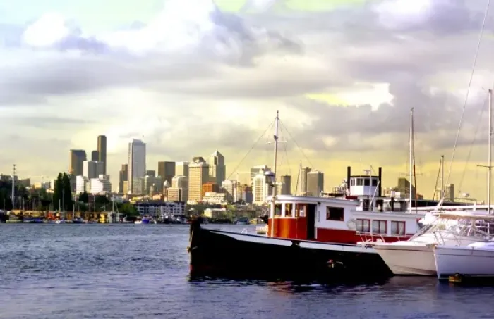 Framed Print : Seattle skyline frames a wooden boat on Lake Union