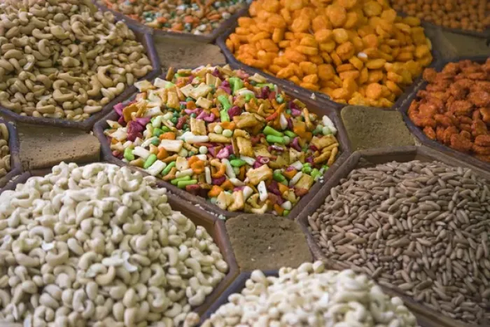 Framed Print : Selling nuts and dried fruit at the market, Dubai, UAE Framed Print : Selling nuts and dried fruit at the market, Dubai, UAE